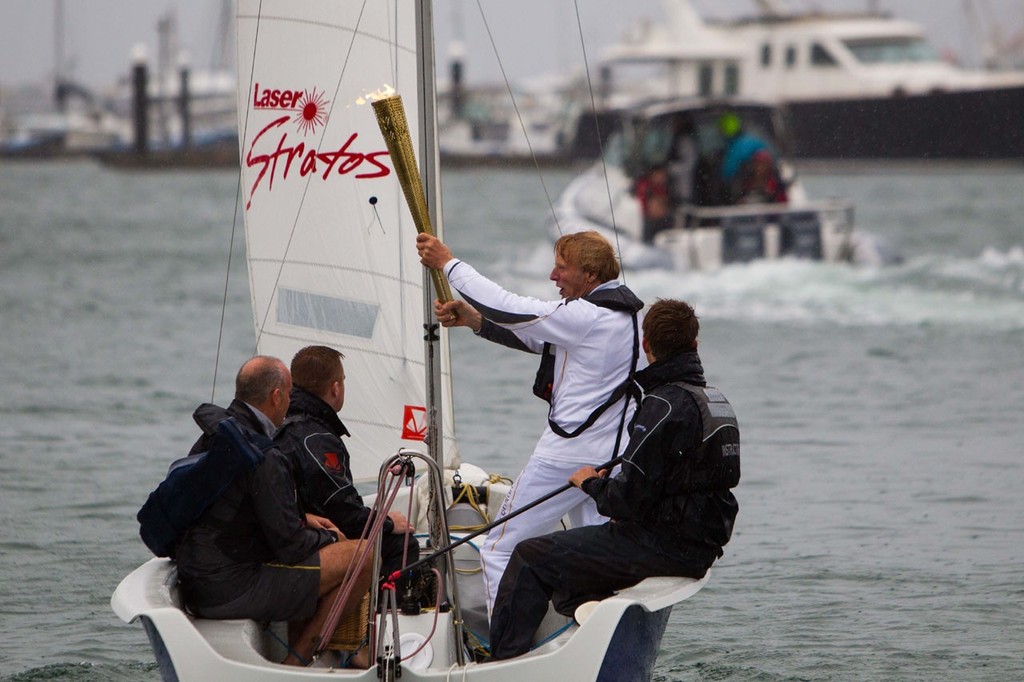 Rodney Pattisson sailing the torch out of WPNSA © RYA http://www.rya.org.uk
